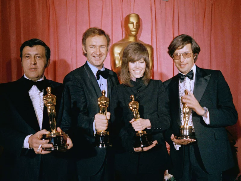 William Friedkin, right, poses with his Oscar for Best Director for The French Connection at the Academy Awards in 1971 with, from left, Philip D'Antoni, producer of the The French Connection, which was also named Best Picture, Gene Hackman, Best Actor for his role in The French Connection, and Jane Fonda, Best Actress for Klute. (AP Photo)